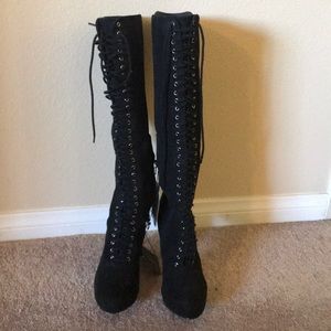 Knee high black lace up boots
